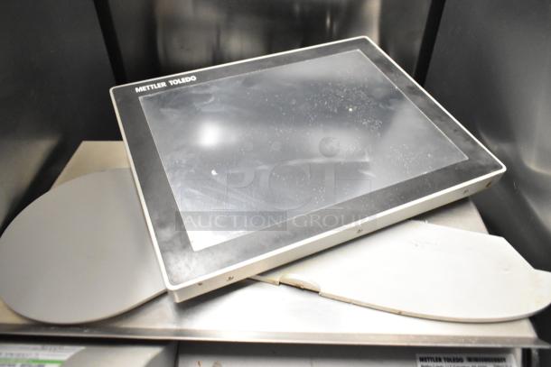 Mettler Toledo UCCW commercial food portioning scale, metal, countertop model, 100-240V, touchscreen, visible wear.