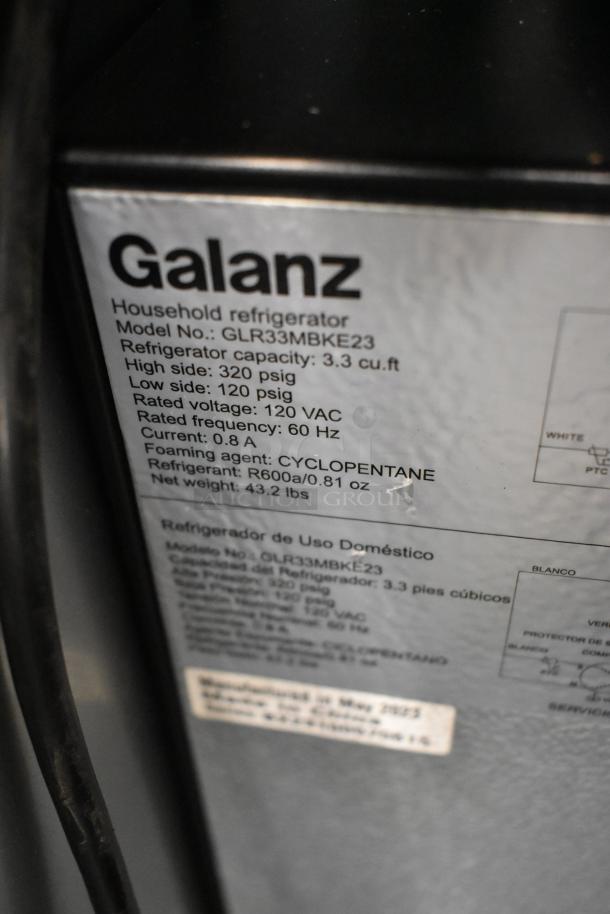 Galanz GLR33MBKE23 Metal Mini Cooler, 3.3 cu.ft, 115V, 1 Phase, label details power specifications and refrigerant info.
