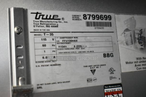 2016 True T-35 stainless steel commercial 2-door reach-in cooler label, showing model, voltage, and refrigerant details.