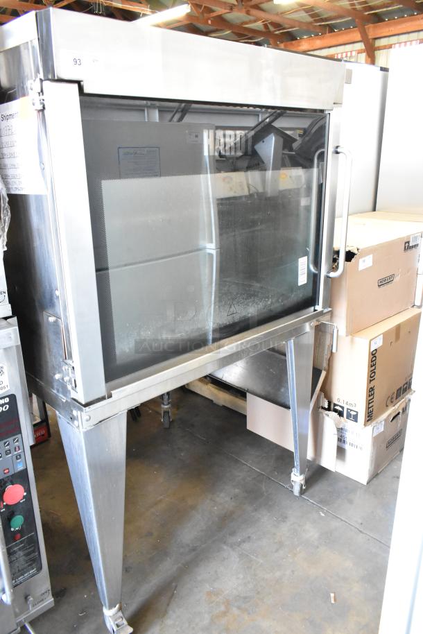 Hardt Inferno 3500 stainless steel rotisserie oven, 40 bird capacity, natural gas, 76,000 BTU, on commercial casters.
