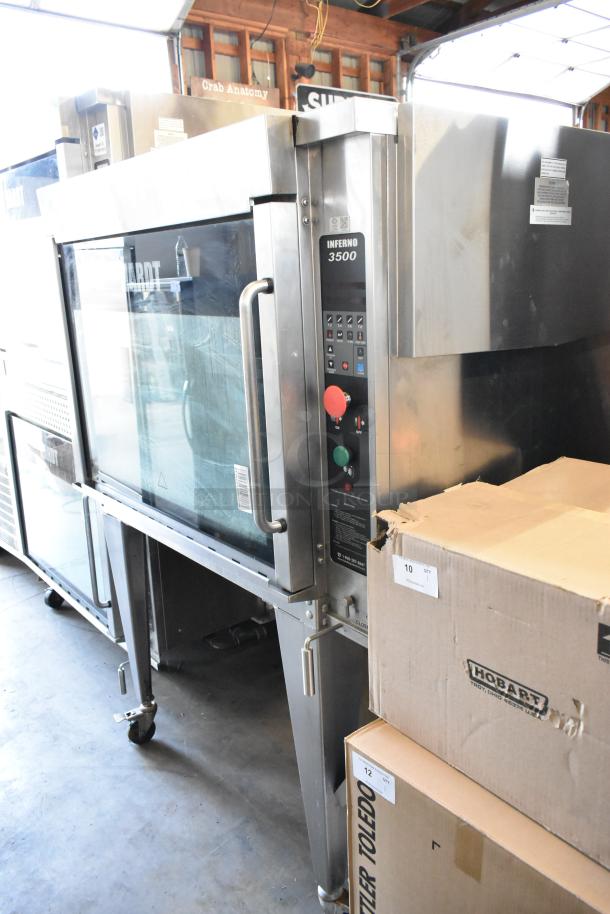 Hardt Inferno 3500 stainless steel rotisserie oven, natural gas, 40-bird capacity, on casters. 76,000 BTU.