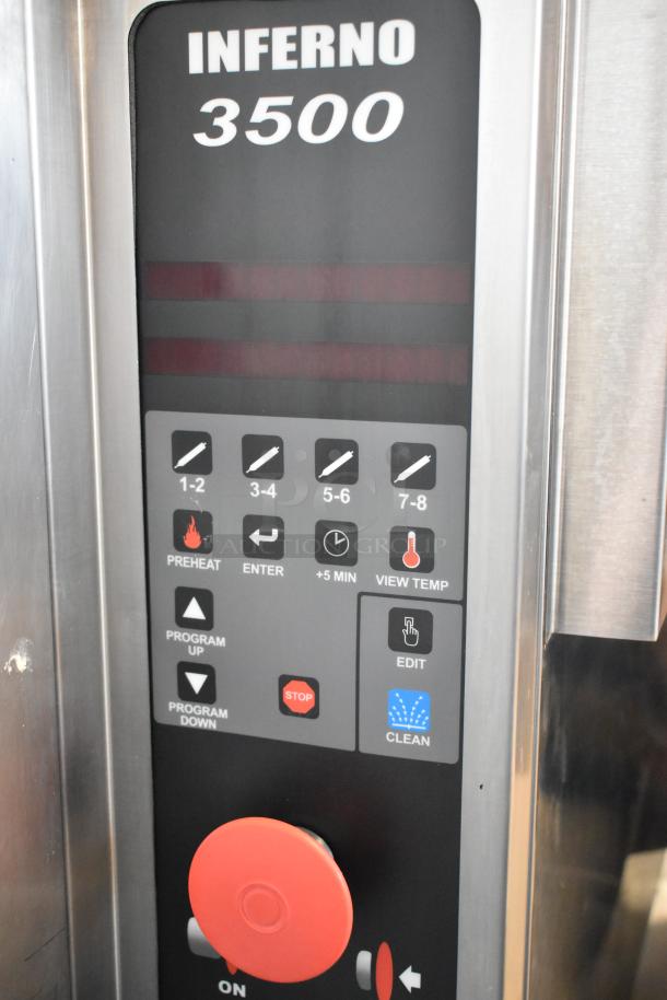 Hardt Inferno 3500 stainless steel commercial rotisserie oven control panel. Features preheat, temperature control, and cleaning functions.
