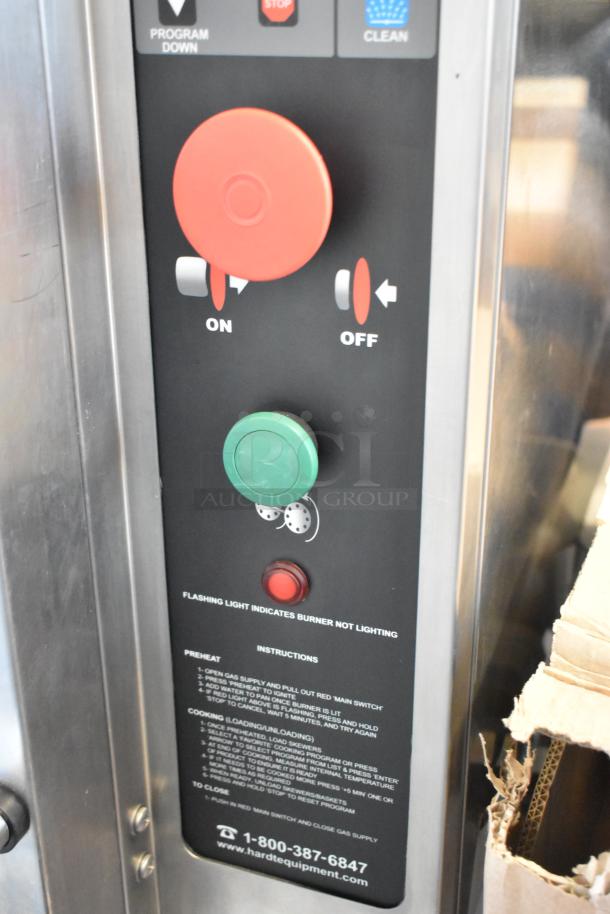 Hardt Inferno 3500 rotisserie oven control panel close-up, showing on/off switches and operation instructions.