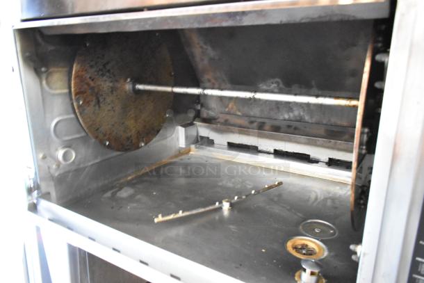 Hardt Inferno 3500 stainless steel commercial rotisserie oven, 40 bird capacity, on commercial casters, 76,000 BTU.