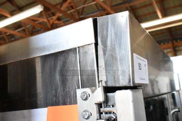 Hardt Inferno 3500 stainless steel rotisserie oven, commercial casters, 40 bird capacity, 76,000 BTU, auction tag 93.