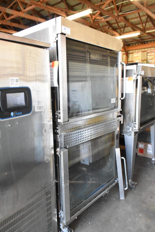 2 Hardt Inferno 3500 stainless steel rotisserie ovens, natural gas, 40 bird capacity each, 76,000 BTU, on casters.