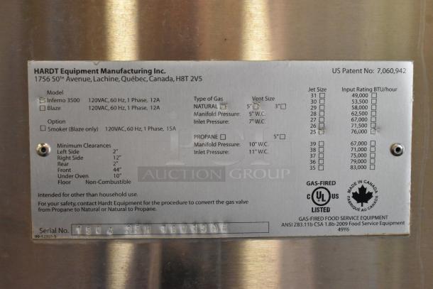 Hardt Inferno 3500 rotisserie ovens, stainless steel, 76,000 BTU, 40 bird capacity each, on commercial casters, natural gas powered.