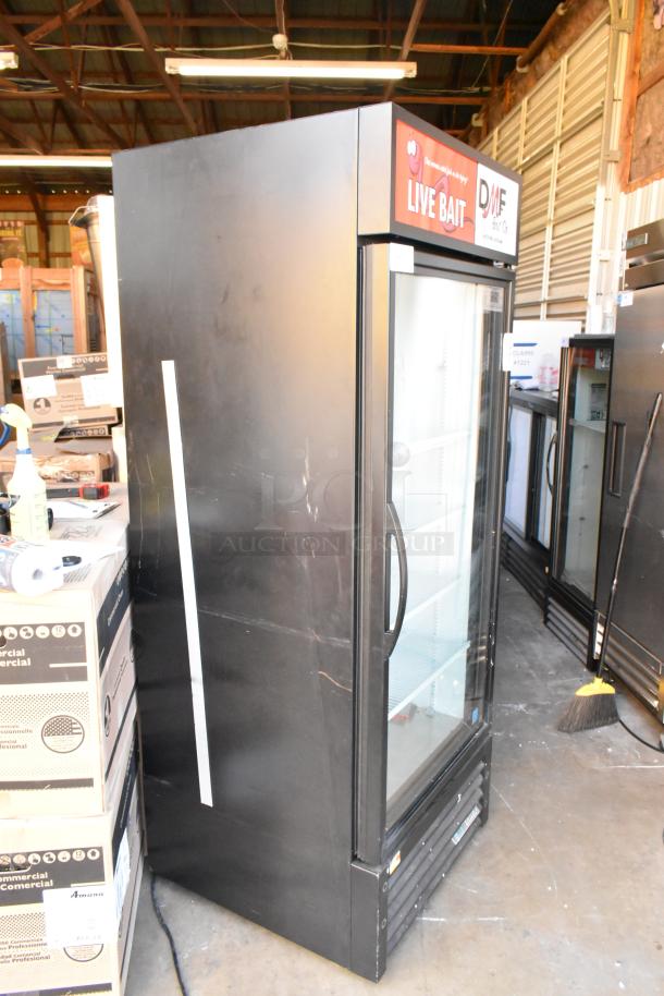 2020 True GDM-26-HC commercial cooler, single glass door, poly-coated racks, 115V, good condition, side view.