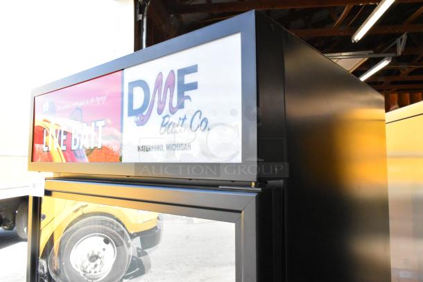 2020 True GDM-26-HC single door merchandiser cooler with DMF Bait Co. branding, poly-coated racks, 115V, 1 phase.