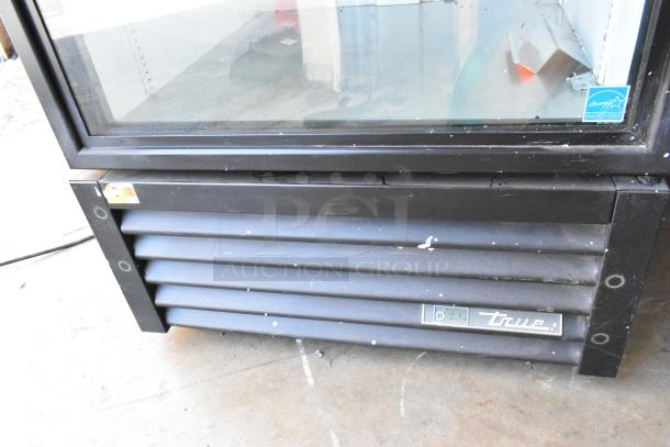 2020 True GDM-26-HC single door cooler, black metal, poly-coated racks, Energy Star label, 115V, 1 phase.