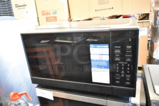 2024 Hamilton Beach MS8436193153-03 metal countertop microwave oven, pristine condition, visible control panel, 115 volts.