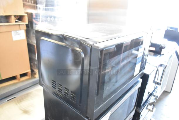 2024 Hamilton Beach MS8436193153-03 metal countertop microwave oven, 115 volts, 1 phase, visible dents on top.