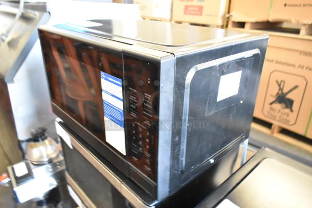 2024 Hamilton Beach MS8436193153-03 metal countertop microwave oven, 115V, 1 phase, in good condition. Front control panel visible.