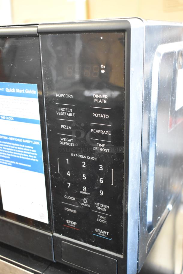 2024 Hamilton Beach MS8436193153-03 microwave oven, black finish, control panel with preset functions, 115 volts, 1 phase.