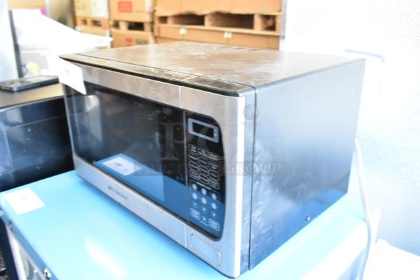 Emerson MW9339SB metal countertop microwave, black and silver, digital display, button controls, 115V, fair condition.