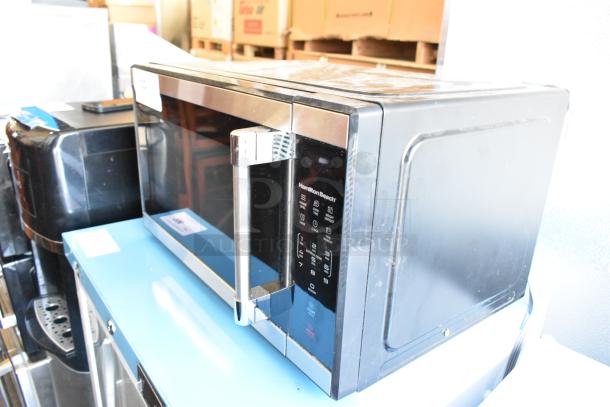2023 Hamilton Beach HB61S100027880 metal countertop microwave oven with control panel, 115 volts, 1 phase, good condition.