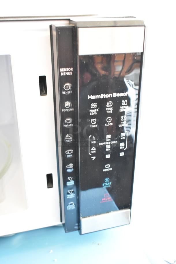 2023 Hamilton Beach HB61B100027880 Metal Countertop Microwave Oven, digital panel with sensor menus, excellent condition.