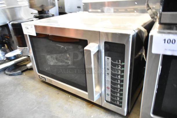 2021 Amana RCS10TS metal countertop microwave oven, 115 volts, excellent condition, visible control panel and Amana logo.