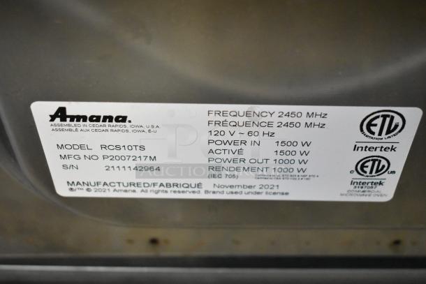 2021 Amana RCS10TS Metal Countertop Microwave Oven with plate. Features: 115 volts, 1 phase. Maker's label shown.