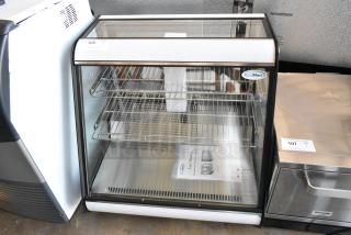 Brand new KoolMore CDC-4C-BK 27" countertop refrigerator display case, with minor scratches and dents, visible User Manual.