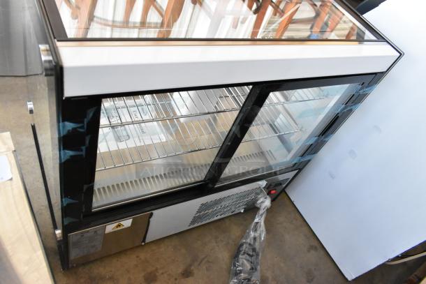 Brand new KoolMore CDC-4C-BK 27" countertop refrigerator display case, scratch and dent condition, 110-120V, 1 Phase.