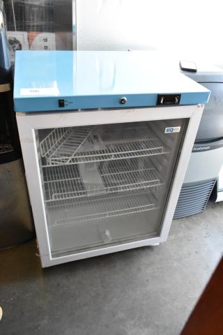 EQ Temp ACR52G metal mini cooler merchandiser with glass door, poly coated racks, 115 volts, 1 phase.