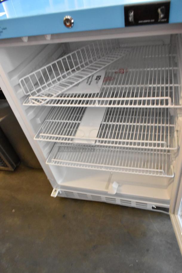 EQ Temp ACR52G mini cooler merchandiser, metal with poly coated racks, 115 volts, 1 phase shown open with racks.