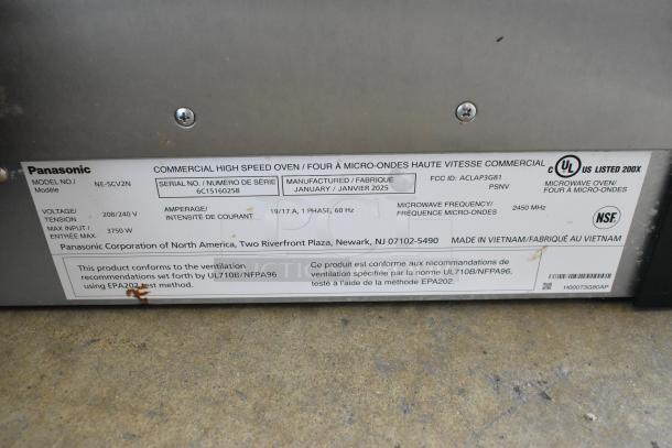 Panasonic NE-SCV2N stainless steel commercial rapid cook oven label showing voltage 208/240V, 1 phase, 3750W, manufactured 2025.
