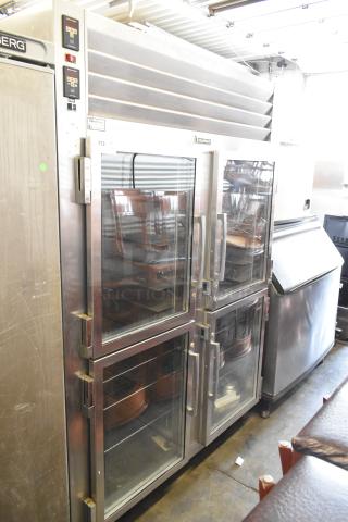 Traulsen stainless steel 2-section, 4 half-door heated holding cabinet and cooler on casters, model RDH232WUT-HHG. Locked doors.