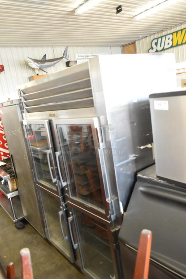 Traulsen RDH232WUT-HHG stainless steel 2-section heated holding cabinet and cooler, 4 half doors, on casters, locked, 115/208V.