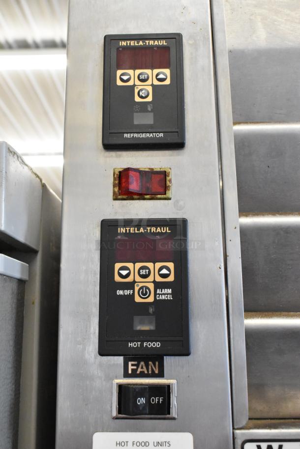 Traulsen RDH232WUT-HHG control panel on stainless steel heated holding cabinet. Features include on/off, alarm cancel, and fan switch.