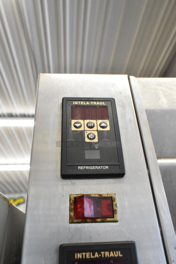 Traulsen RDH232WUT-HHG control panel close-up, showing buttons and temperature display on stainless steel commercial cabinet.