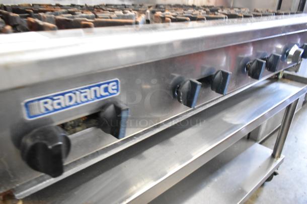 Radiance stainless steel 6 burner commercial range with backsplash, undershelves, overshelves, and casters, showing brand logo.