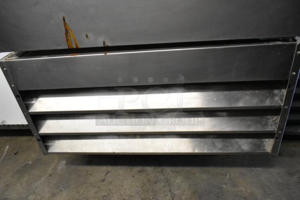 Avantco 178A19RHC stainless steel commercial cooler base with visible rust and signs of wear. Equipped with louvered ventilation.