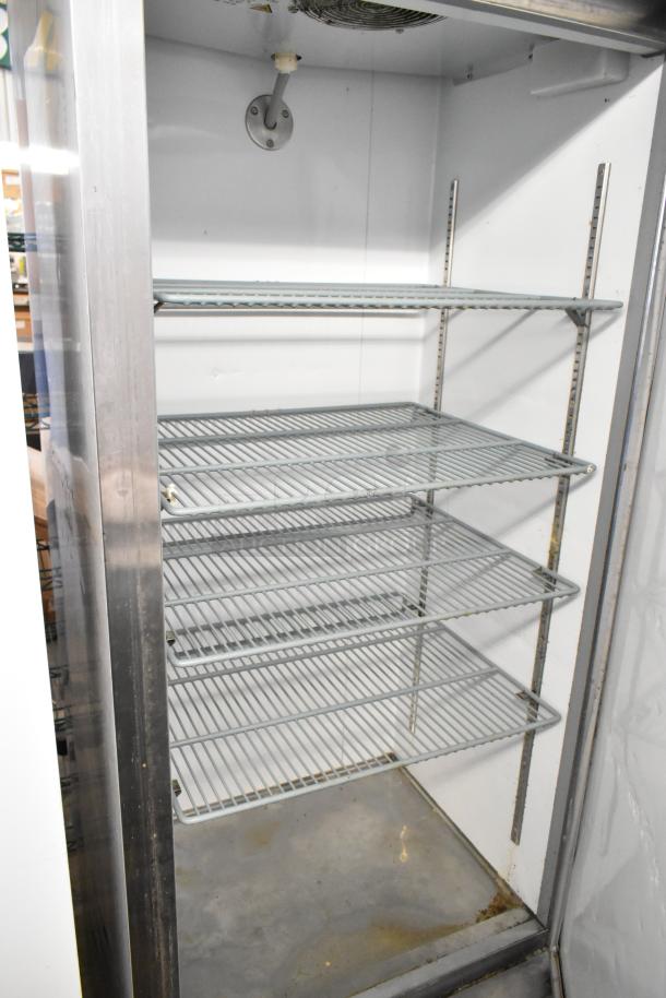 Avantco 178A19RHC stainless steel single door cooler with poly-coated racks on casters, 115V, 1 phase. Clean with minor wear.