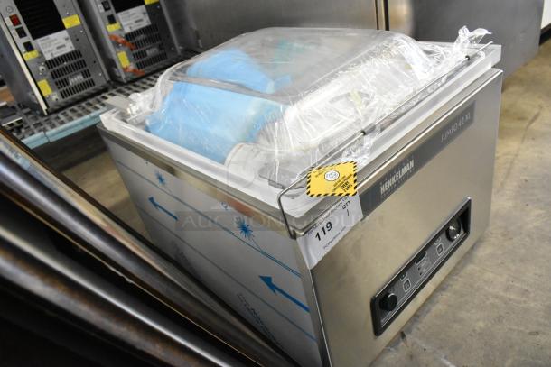 Henkelman Jumbo 42 XL stainless steel commercial vacuum sealer, model ETL, 110-120V, 1 phase, in good condition.
