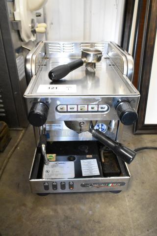La Cimbali M21 Junior NF stainless steel espresso machine with portafilter, steam wand; single group commercial model.