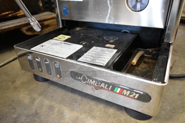 La Cimbali M21 Junior NF stainless steel espresso machine with portafilter, steam wand, and control panel. 120V, 1 phase.