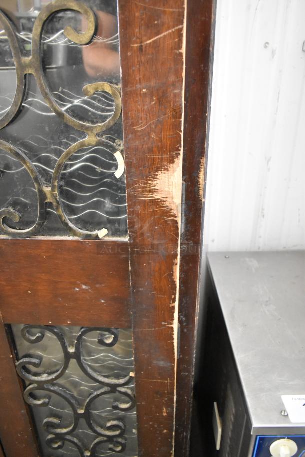 Vinotemp VT-RIOJA4 wooden wine cabinet, ornate metal detailing, visible wear on door, 120 volts, 1 phase.