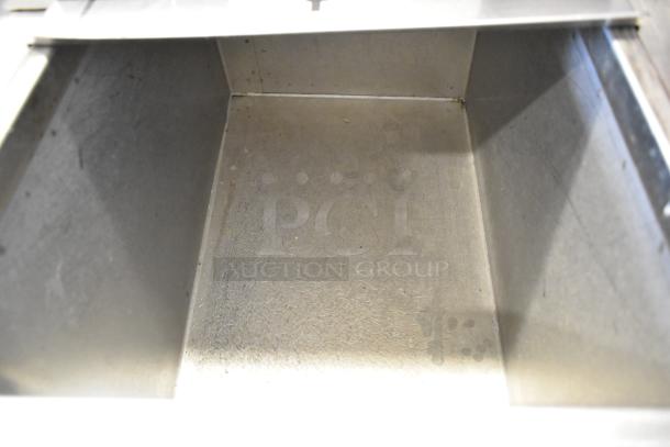 Stainless steel commercial 6 flavor beverage machine on ice bin, 115V, 1 phase, interior view.
