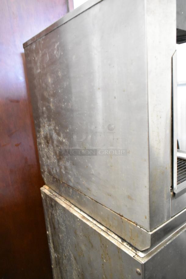 Stainless steel commercial 6-flavor carbonated beverage machine on ice bin. Visible wear, 115 volts, 1 phase.