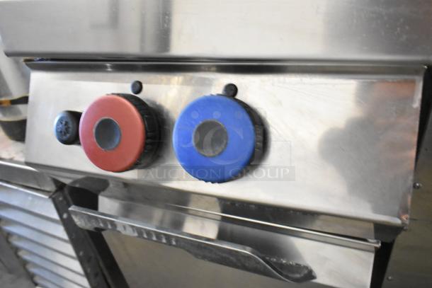 Rosito Bisani stainless steel gas-powered pasta cooker with 6 metal fry baskets, commercial grade, floor style, control knobs.