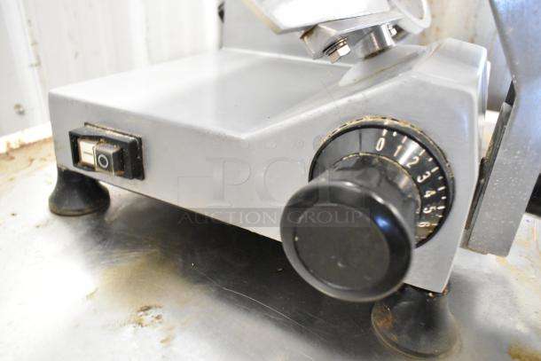 Backyard Pro 554SL112E meat slicer with blade sharpener, metal body, adjustable thickness dial, 115 volts, one-phase.