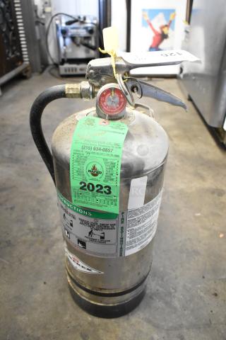 Amerex wet chemical fire extinguisher with inspection tags, 2023 label, metal body, hose, and pressure gauge. Buyer pick-up only.