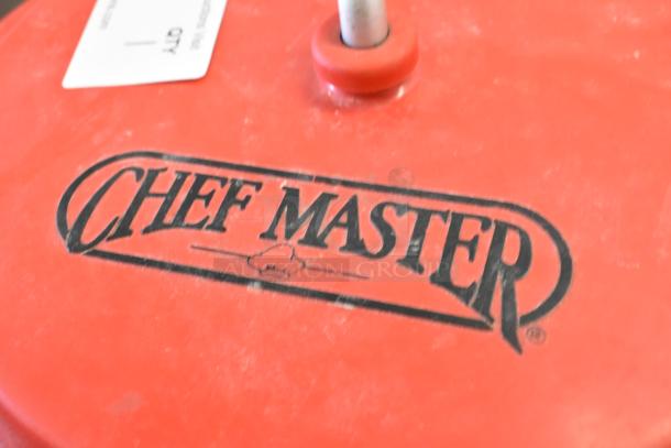 Chef Master red poly lettuce spinner, featuring the logo on top. Appears in fair condition with visible wear.