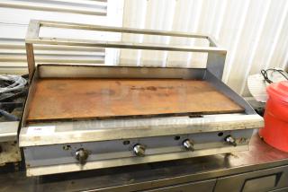 2021 Cooking Performance Group 351GTCPG48NL flat top griddle, stainless steel, natural gas, thermostatic controls, over shelf.