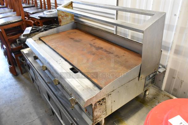 2021 Cooking Performance Group CPG 351GTCPG48NL stainless steel flat top griddle, natural gas, thermostatic controls, overshelf.