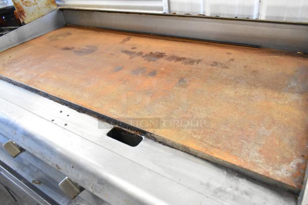2021 Cooking Performance Group CPG 351GTCPG48NL stainless steel commercial flat top griddle, natural gas, thermostatic.