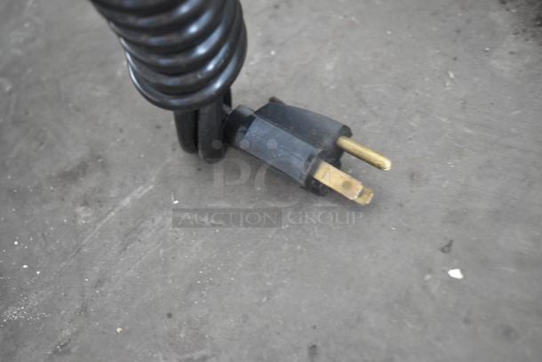 Dough Xpress DXE-W commercial dough press power cord with standard 120V plug. Coiled black cord, appears in good condition.