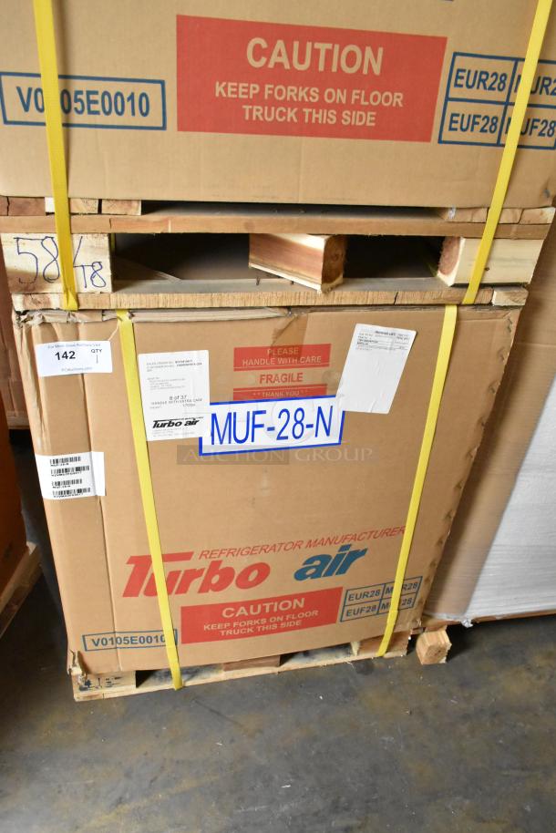 Boxed Turbo Air MUF-28-N stainless steel undercounter freezer, new condition, labeled with model and handling warnings.